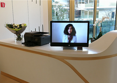DIY virtual receptionist software shown on an all-in-one reception display